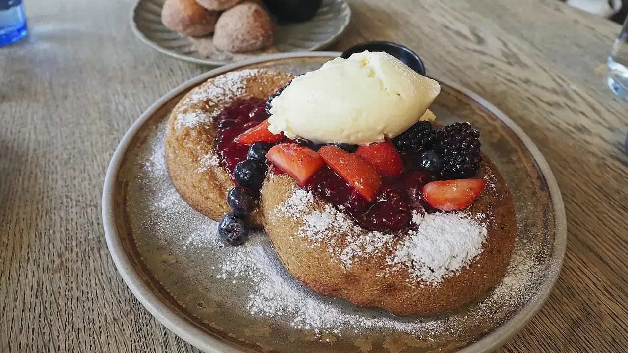 Pancakes with ice cream and berries